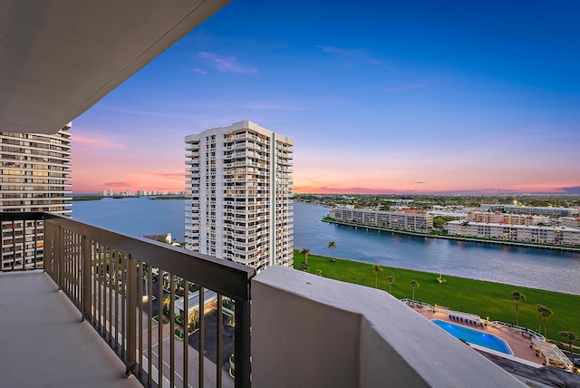 balcony featuring a water view