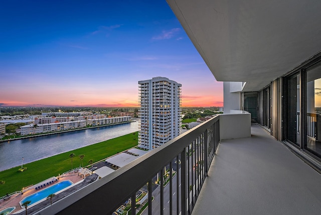balcony featuring a water view