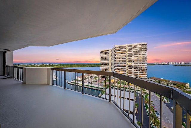 balcony featuring a water view