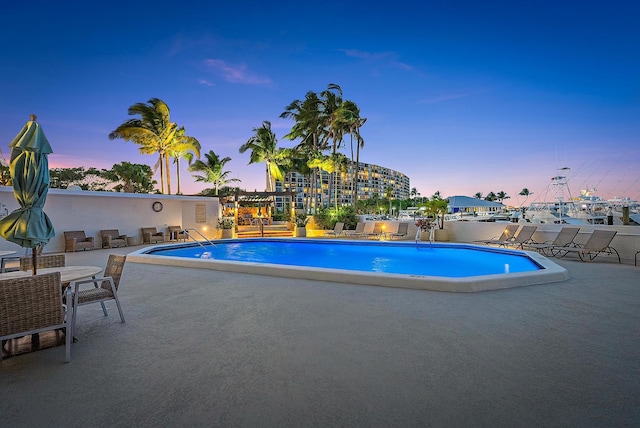 pool with a patio