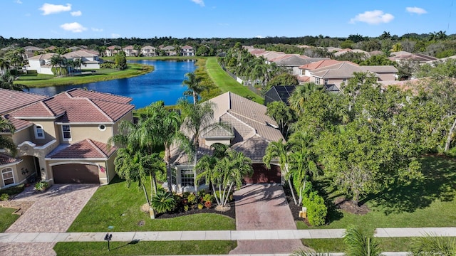 aerial view featuring a water view and a residential view