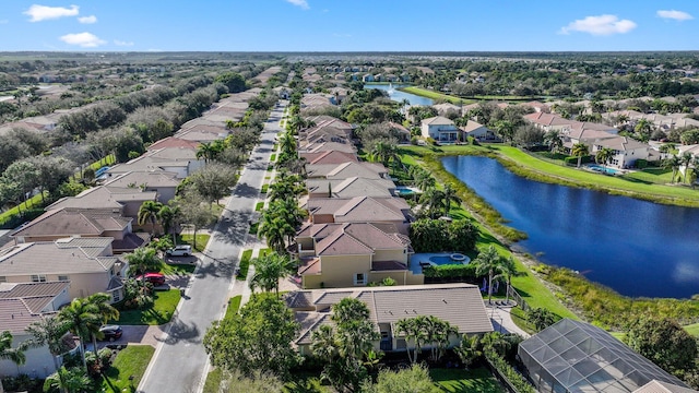 birds eye view of property featuring a residential view and a water view