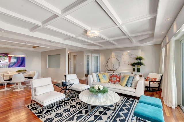 living room featuring coffered ceiling, wood finished floors, and beam ceiling