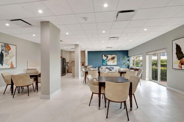 dining space with recessed lighting, visible vents, and baseboards