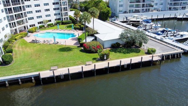 birds eye view of property with a water view