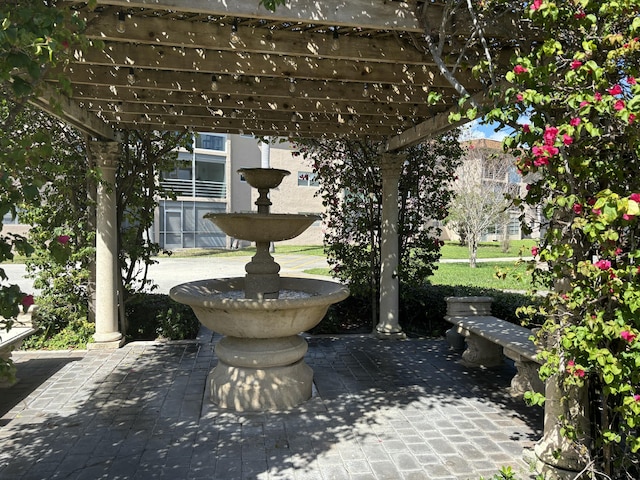 view of home's community featuring a patio and a pergola