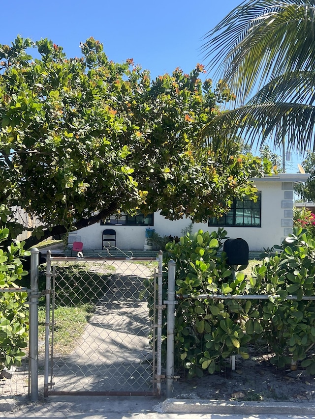 view of gate with fence