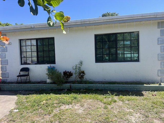 view of home's exterior with stucco siding