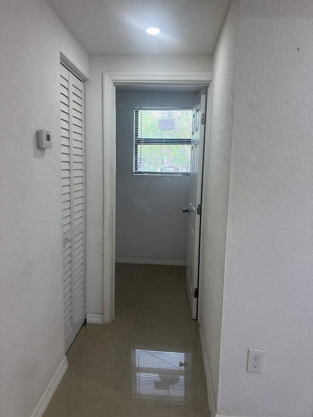 410 S D St, Lake Worth Beach, FL 33460 - corridor with tile patterned flooring and baseboards