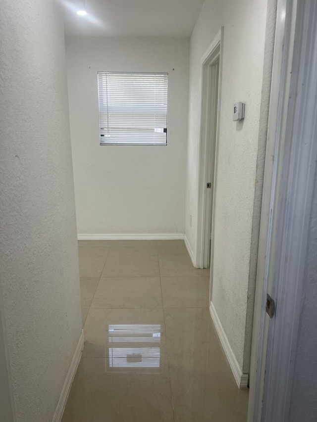 410 S D St, Lake Worth Beach, FL 33460 - hall featuring baseboards and a textured wall