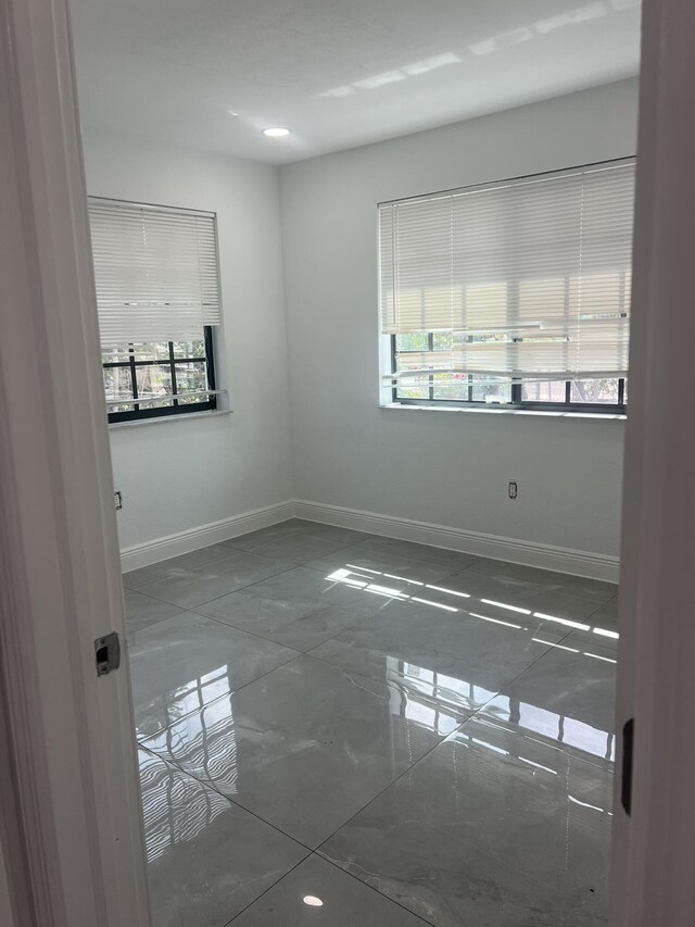 410 S D St, Lake Worth Beach, FL 33460 - empty room featuring baseboards