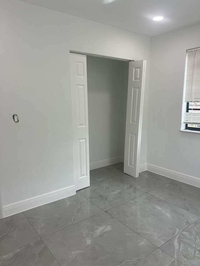 410 S D St, Lake Worth Beach, FL 33460 - interior space featuring a closet and baseboards