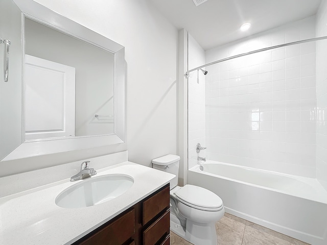 full bathroom featuring toilet, tile patterned flooring, bathtub / shower combination, and vanity