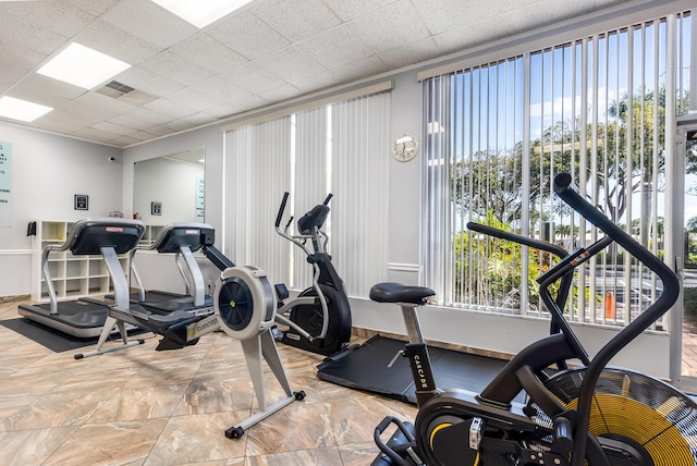 exercise room featuring visible vents