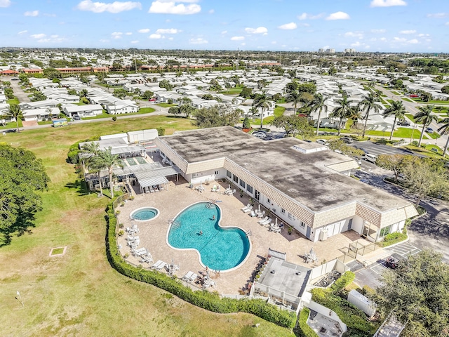 birds eye view of property with a residential view