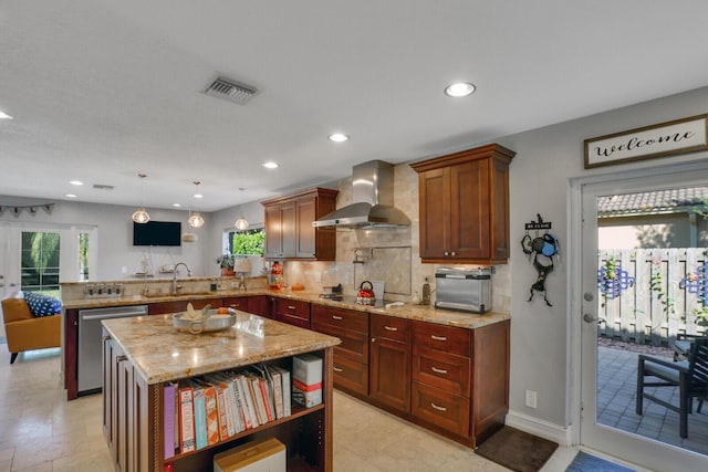 kitchen featuring visible vents, wall chimney exhaust hood, a peninsula, open shelves, and a sink