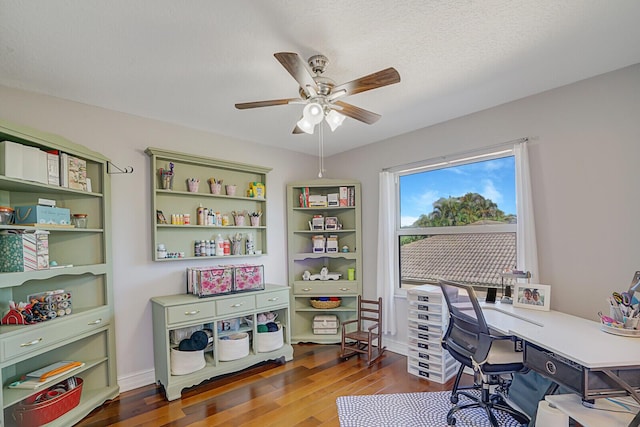 office space featuring a ceiling fan, a textured ceiling, and wood finished floors