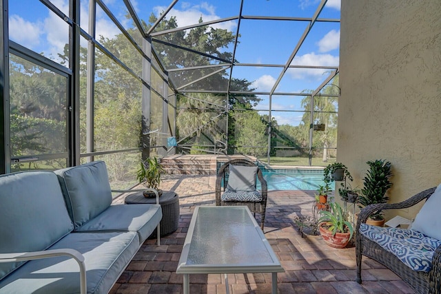 view of patio with a lanai, an outdoor living space, and an outdoor pool