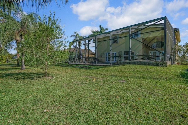 view of yard featuring a lanai