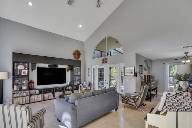 living room featuring visible vents, vaulted ceiling, a ceiling fan, and french doors