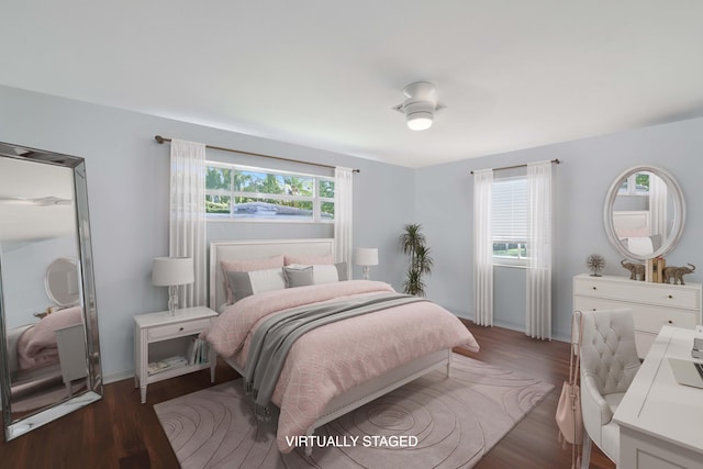 bedroom featuring dark wood-type flooring