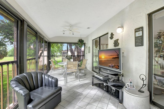 sunroom / solarium with ceiling fan and visible vents