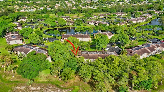 aerial view featuring a water view and a residential view