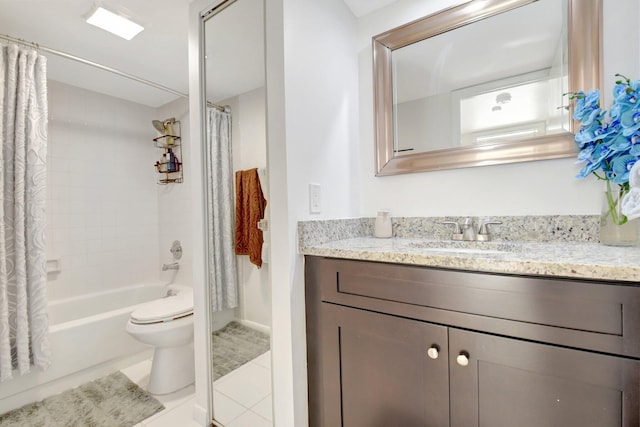 full bath featuring toilet, tile patterned flooring, vanity, and shower / bath combo with shower curtain