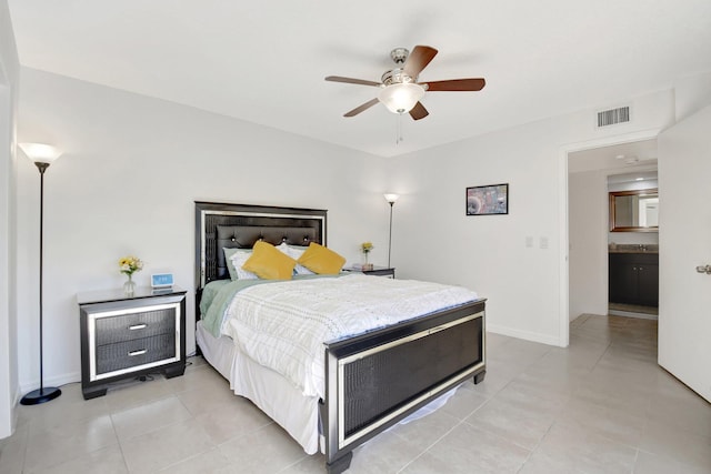 bedroom with ceiling fan, light tile patterned flooring, visible vents, and baseboards