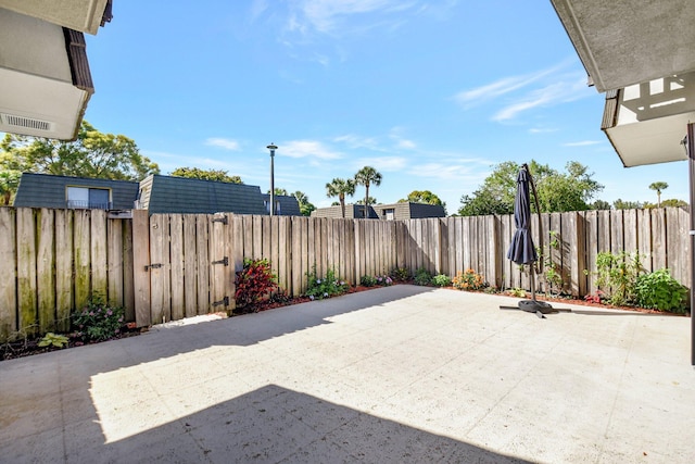 view of patio featuring a fenced backyard