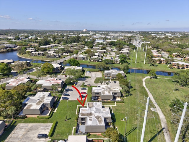 aerial view featuring a water view and a residential view