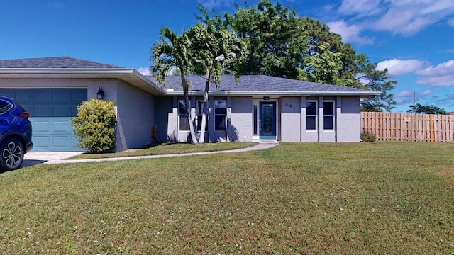 ranch-style home featuring an attached garage, a shingled roof, fence, stucco siding, and a front lawn