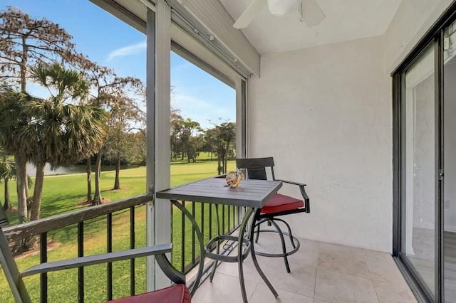 balcony featuring ceiling fan