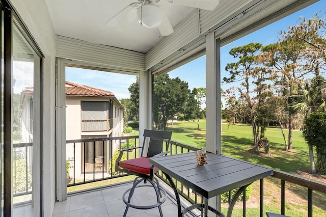 balcony featuring a ceiling fan