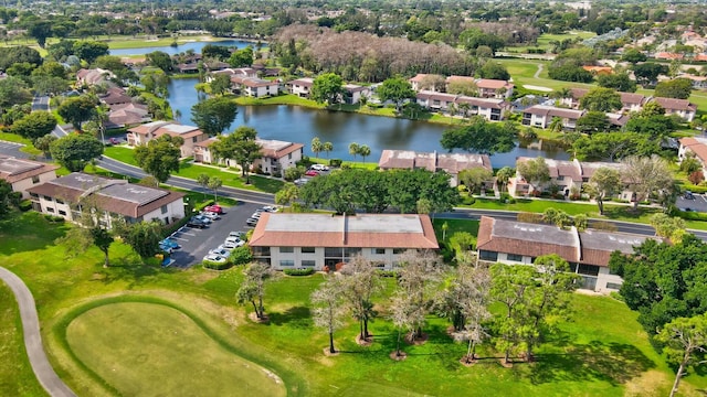 bird's eye view with a water view and a residential view