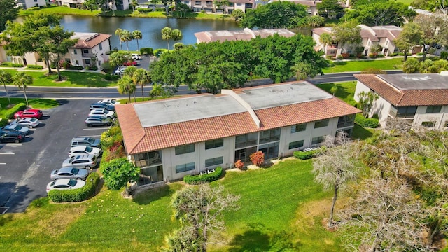 aerial view with a residential view and a water view