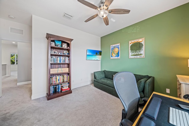 office area with a ceiling fan, light colored carpet, visible vents, and baseboards