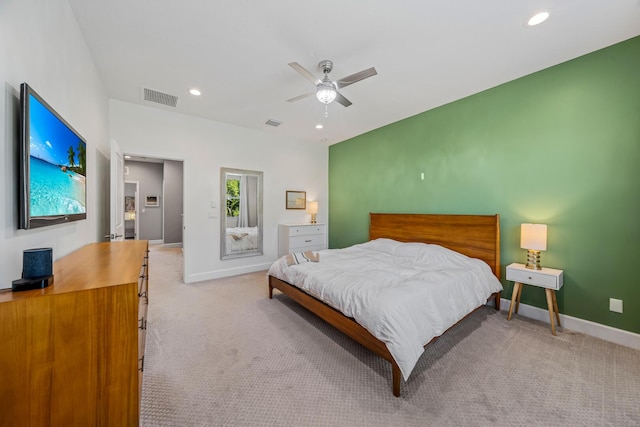 bedroom featuring recessed lighting, baseboards, visible vents, and light colored carpet