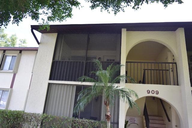 exterior space with stucco siding