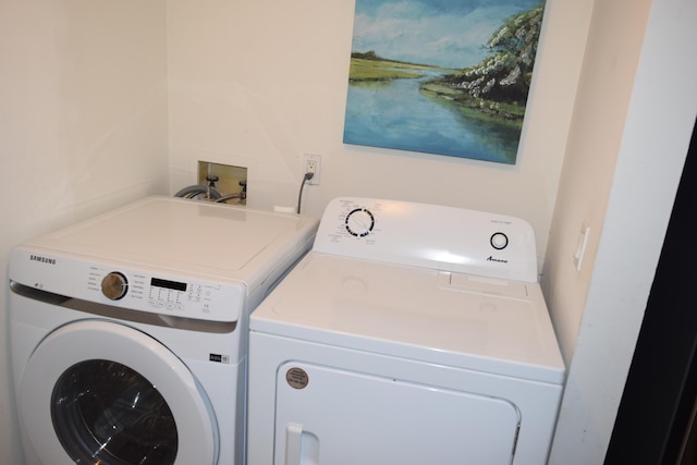 laundry room featuring laundry area and separate washer and dryer