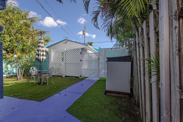 view of yard with fence