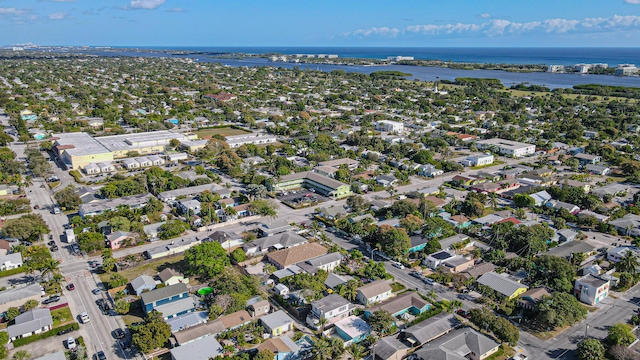 aerial view featuring a water view and a residential view