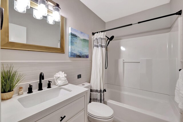 laundry room featuring stacked washer and dryer and laundry area