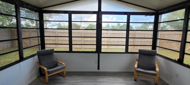 sunroom / solarium with lofted ceiling