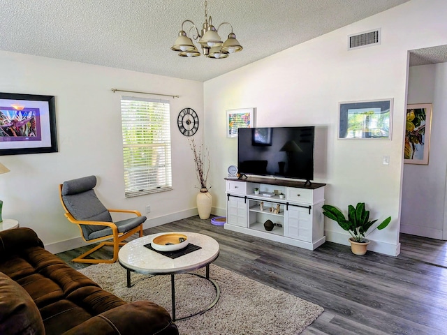 5151 Brian Blvd, Boynton Beach, FL 33472 - living area with a chandelier, a textured ceiling, dark wood-type flooring, and lofted ceiling