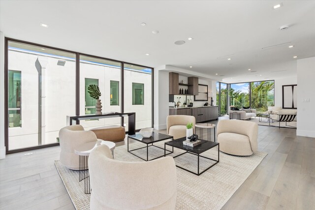 interior space with expansive windows, modern cabinets, visible vents, and open shelves