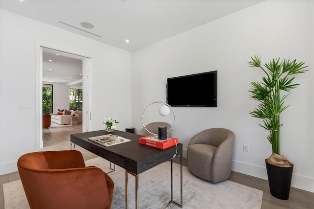 office area featuring recessed lighting, baseboards, and wood finished floors