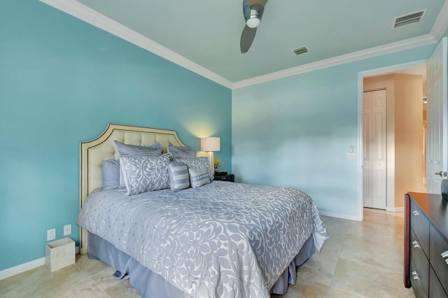 bedroom with visible vents, crown molding, and baseboards