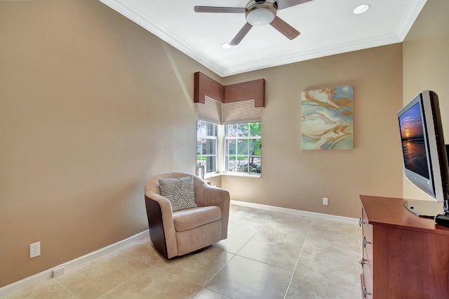 sitting room featuring light tile patterned floors, ceiling fan, baseboards, and crown molding