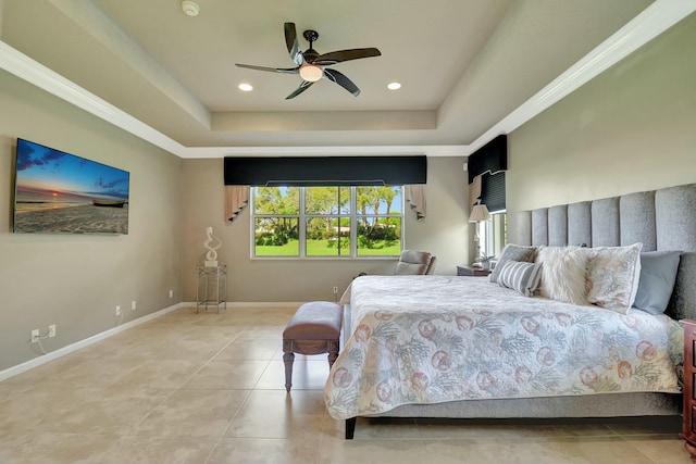 tiled bedroom with baseboards, a tray ceiling, ceiling fan, and recessed lighting